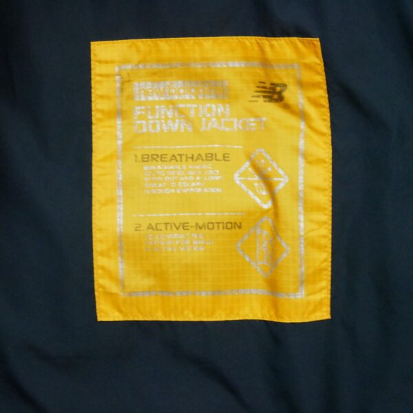 Doudoune homme manches longues jaune New Balance Col Montant QWE2193