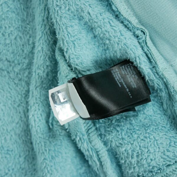 Veste polaires enfant manches longues turquoise The North Face Col Montant QWE0250