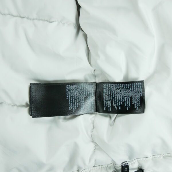 Doudoune femme sans manches blanc The North Face Col Montant QWE2130