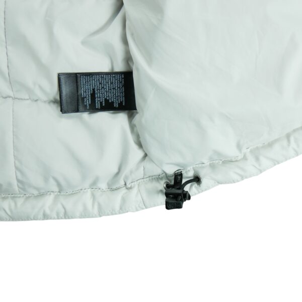 Doudoune femme sans manches blanc The North Face Col Montant QWE2130