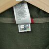 Pull polaires homme manches longues kaki The North Face Col Montant