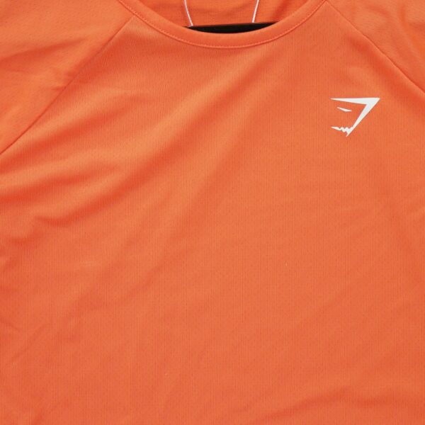 T shirt femme manches longues orange Gymshark Col Rond