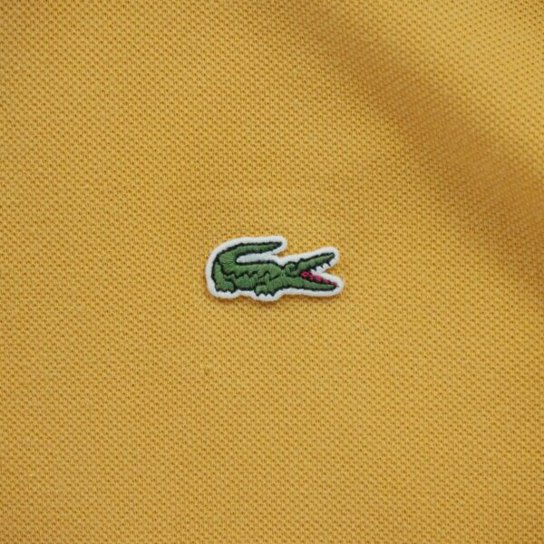 Polo manches courtes femme orange Lacoste Col Polo