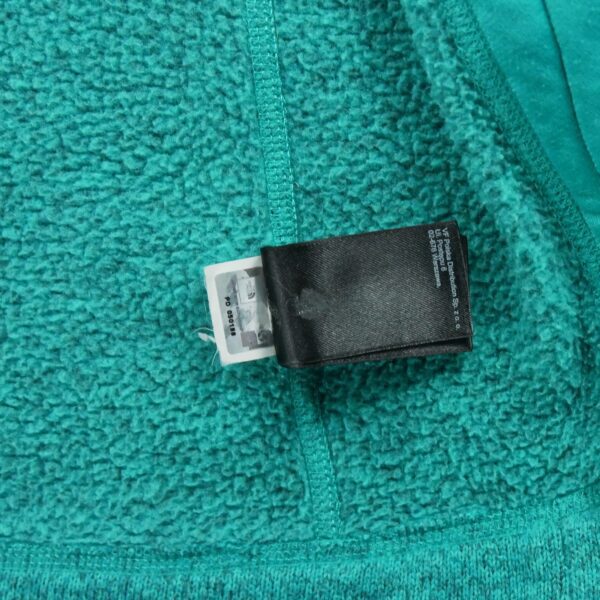 Veste polaires femme manches longues turquoise The North Face Motif chine Col Montant