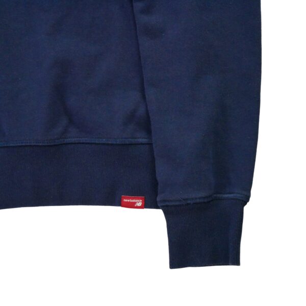 Sweat femme manches longues marine New Balance Col Rond