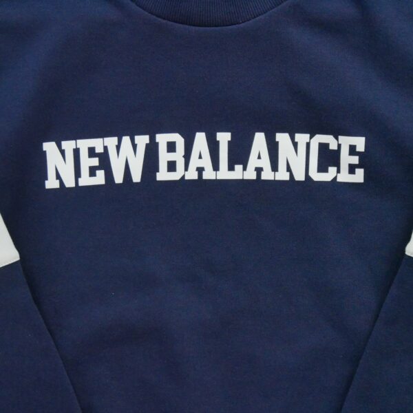 Sweat femme manches longues marine New Balance Col Rond