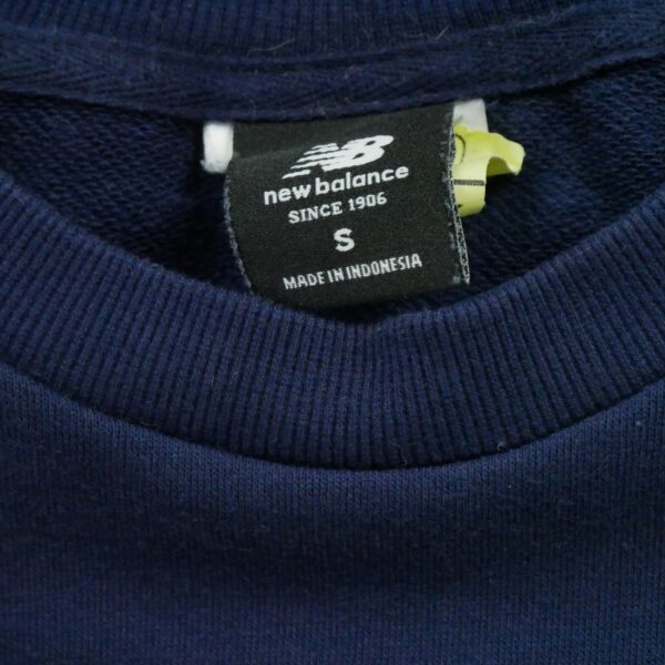 Sweat femme manches longues marine New Balance Col Rond