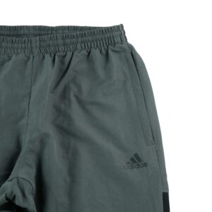Adidas Pantalon de survetement zippe vert fonce