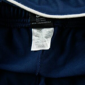 Nike Dri FIT pantalon de survetement zippe bleu marine