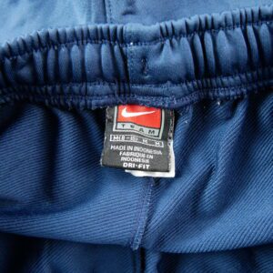 Nike Dri FIT pantalon de survetement zippe bleu marine