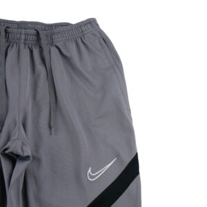 Nike jogging Dri FIT gris a bande diagonale noire