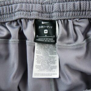 Nike jogging Dri FIT gris a bande diagonale noire