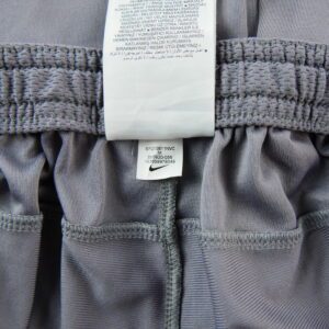 Nike jogging Dri FIT gris a bande diagonale noire