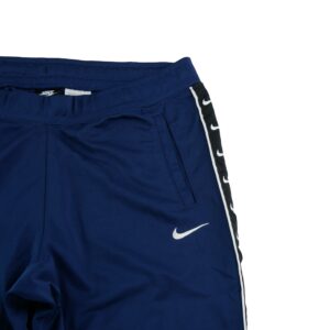 Nike pantalon de survetement bande Swoosh repetee bleu marine