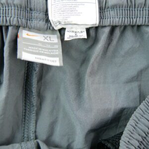 Nike pantalon de survetement gris a liseres orange