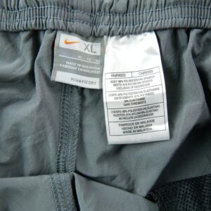 Nike pantalon de survetement gris a liseres orange