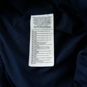Nike Season Woven pantalon de survetement bleu marine a bandes vertes